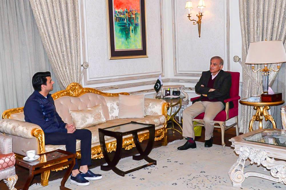 Jawad Sohrab Malik, nephew of Federal Minister for Privatisation Muhammad Mian Soomro (L) speaking to Leader of the Opposition in the National Assembly Shahbaz Sharif — Provided by the correspondent