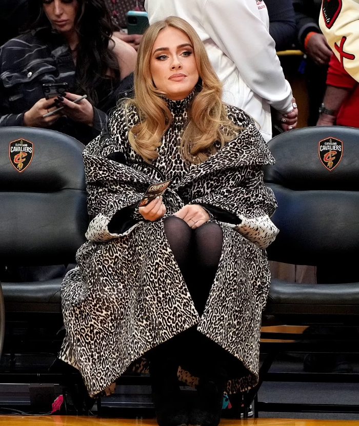Adele seen without diamond ring in latest outing with beau Rich Paul