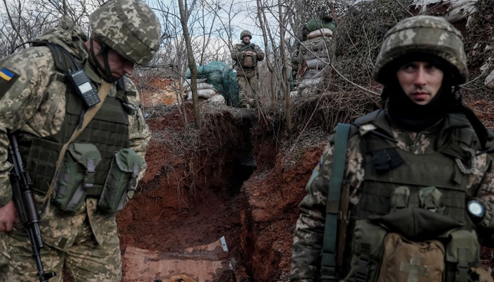 Ukrainian service members are seen on the front line near the city of Novoluhanske in the Donetsk region, Ukraine February 20, 2022. — Reuters