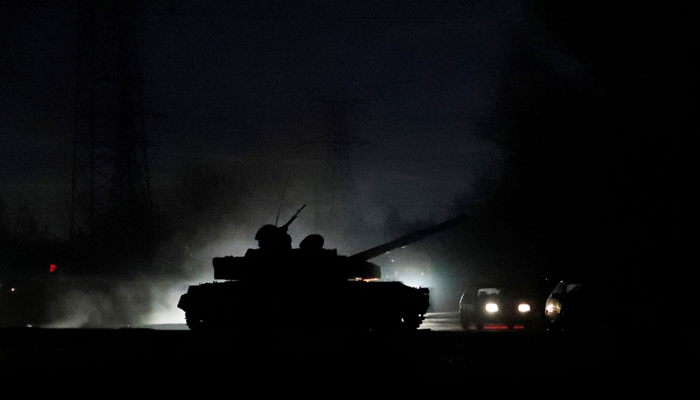 A tank drives along a street after Russian President Vladimir Putin ordered the deployment of Russian troops to two breakaway regions in eastern Ukraine following the recognition of their independence, in the separatist-controlled city of Donetsk, Ukraine February 22, 2022. — Reuters