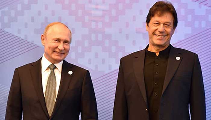 Russian President Vladimir Putin and Prime Minister Imran Khan pose for a photo prior to a meeting of the Shanghai Cooperation Organisation (SCO) Council of Heads of State in Bishkek on June 14, 2019. — AFP