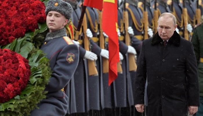 Russian President Vladimir Putin takes part in a wreath laying ceremony at the Tomb of the Unknown Soldier by the Kremlin Wall on the Defender of the Fatherland Day in Moscow, Russia February 23, 2022. — Reuters