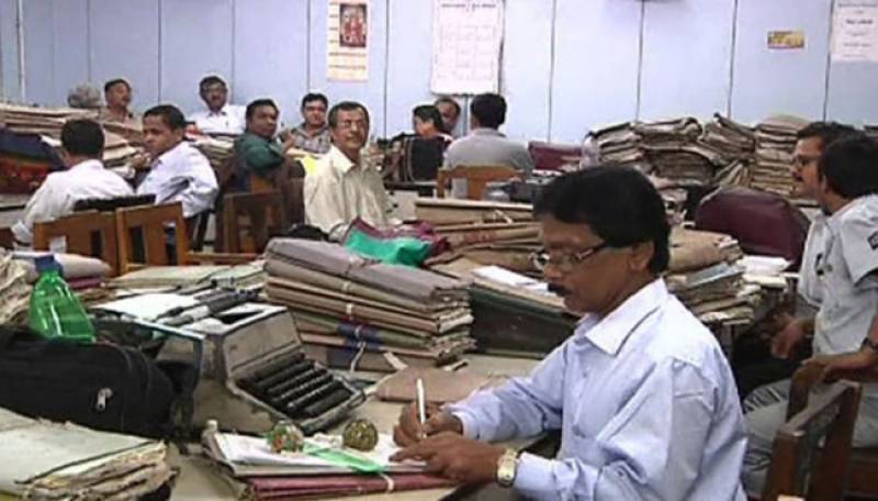 Government office workers in Pakistan. Photo:File