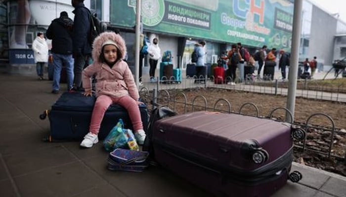 People wait to return to the city at Kyiv Airport after Russian President Vladimir Putin authorized a military operation in eastern Ukraine, February 24, 2022. — Reuters