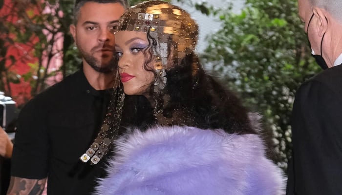 Pregnant Rihanna stuns in latex crop top at Milan Fashion Week with A$AP Rocky