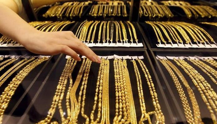 Gold chains can be seen displayed at  a jewellery shop. — Reuters/File