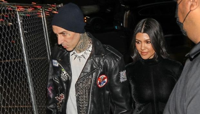 Kourtney Kardashian walks hand-in-hand with Travis Barker at Avril Lavigne Concert