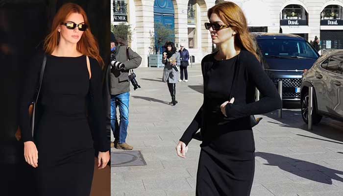 Kendall puts her newly transformed auburn tresses on display as she steps out in Paris.