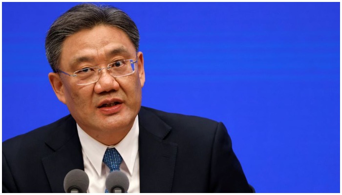 Chinese Commerce Minister Wang Wentao attends a State Council Information Office news conference in Beijing, China February 24, 2021. Photo: Reuters
