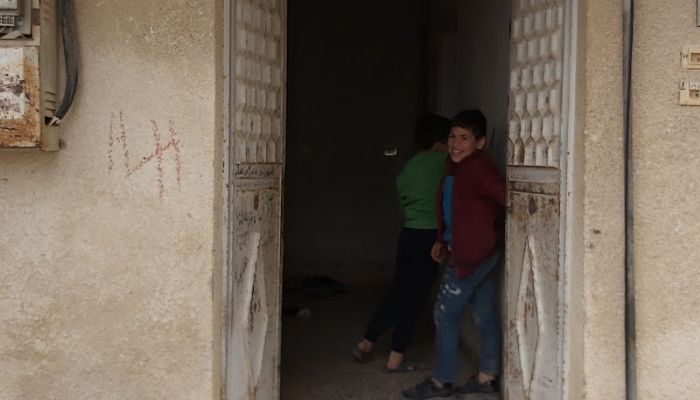 Children playing in one of the houses in Damascus alleys