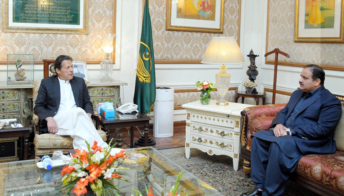Prime Minister Imran Khan meets Chief Minister Punjab Usman Buzdar during his day-long visit to Lahore on March 1, 2022. — PID