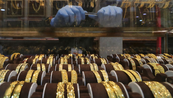 Seller waits for customers at a jewellery showroom during Dhanteras, a Hindu festival associated with Lakshmi, the goddess of wealth, amidst the spread of COVID-19 in Mumbai, India, November 13, 2020. — Reuters/File