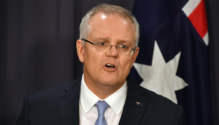 Australian PM tests positive for COVID-19, isolates 2 Australian PM tests positive for COVID-19, isolates