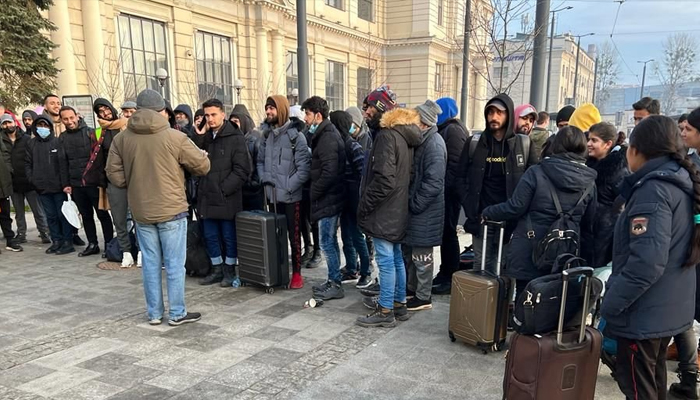 People standing outside Pakistan mission in Lviv amid the Ukraine-Russia conflict. — Twitter/PakinUkraine