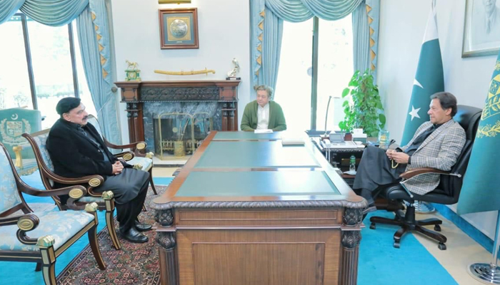Interior Minister Shaikh Rasheed in a meeting with PM Imran Khan. — Twitter/PTI