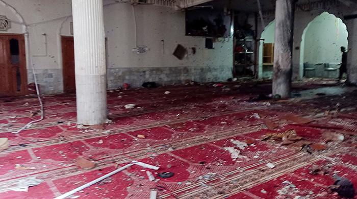 Suicide attack on Peshawar mosque during Friday prayers kills 57 worshippers, injures close to 200