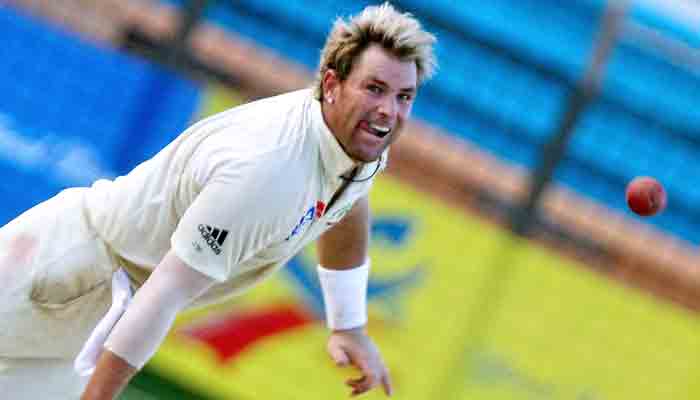 In this file photograph taken on April 19, 2006, Australian cricketer Shane Warne delivers a ball during the fourth day of the second Test match between Bangladesh and Australia at The Chittagong Divisional Stadium in Chittagong. Australia cricket great Shane Warne, widely regarded as one of the greatest Test players of all time, has died of a suspected heart attack aged 52, according to a statement from his management company on March 4, 2022, Warnes management said the retired leg-spinner died in Koh Samui, Thailand. -AFP