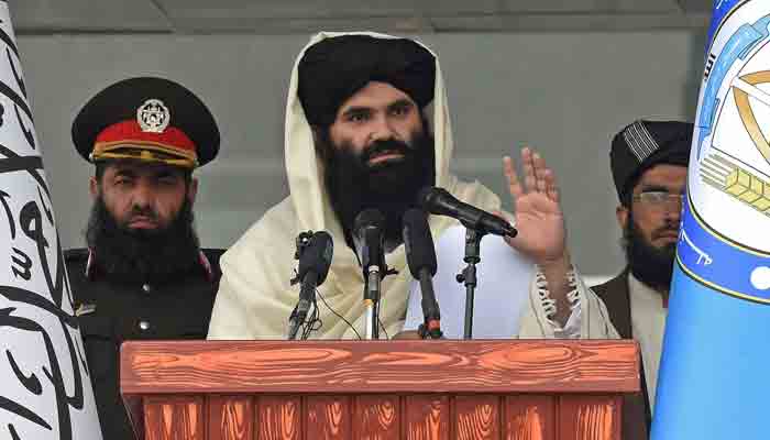 Taliban Interior Minister Sirajuddin Haqqani speaks to new Afghan police recruits during a graduation ceremony at the police academy in Kabul on March 5, 2022. -AFP