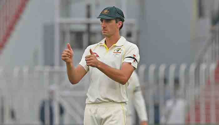 Australia´s captain Pat Cummins gestures after Pakistan declared their first inning during the second day of play of the first Test cricket match between Pakistan and Australia at the Rawalpindi Cricket Stadium in Rawalpindi on March 5, 2022. -AFP