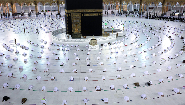 In this file photo taken on April 13, 2021, Muslim worshippers perform the evening Tarawih prayer during the fasting month of Ramadan around the Kaaba in the Grand Mosque complex in the holy city of Mecca. — AFP