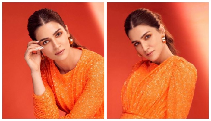 Kriti Sanon sends temperatures soaring as she displays her orange mini dress amid ‘Bachchhan Paandey’ promotions