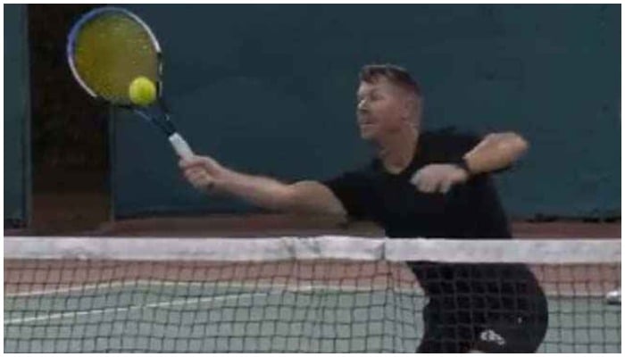 David Warner playing tennis. —Instagram/@davidwarner31