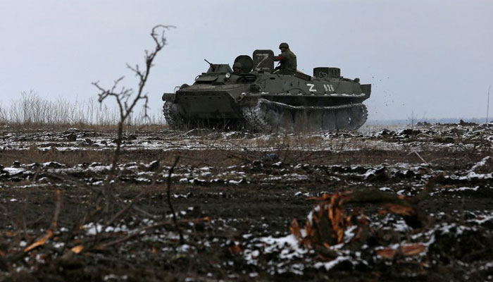 Service members of pro-Russian troops in uniforms without insignia drive an armoured vehicle with the letters Z painted on it in the separatist-controlled town of Volnovakha during the Ukraine-Russia conflict in the Donetsk region, Ukraine March 11, 2022. — Reuters/File