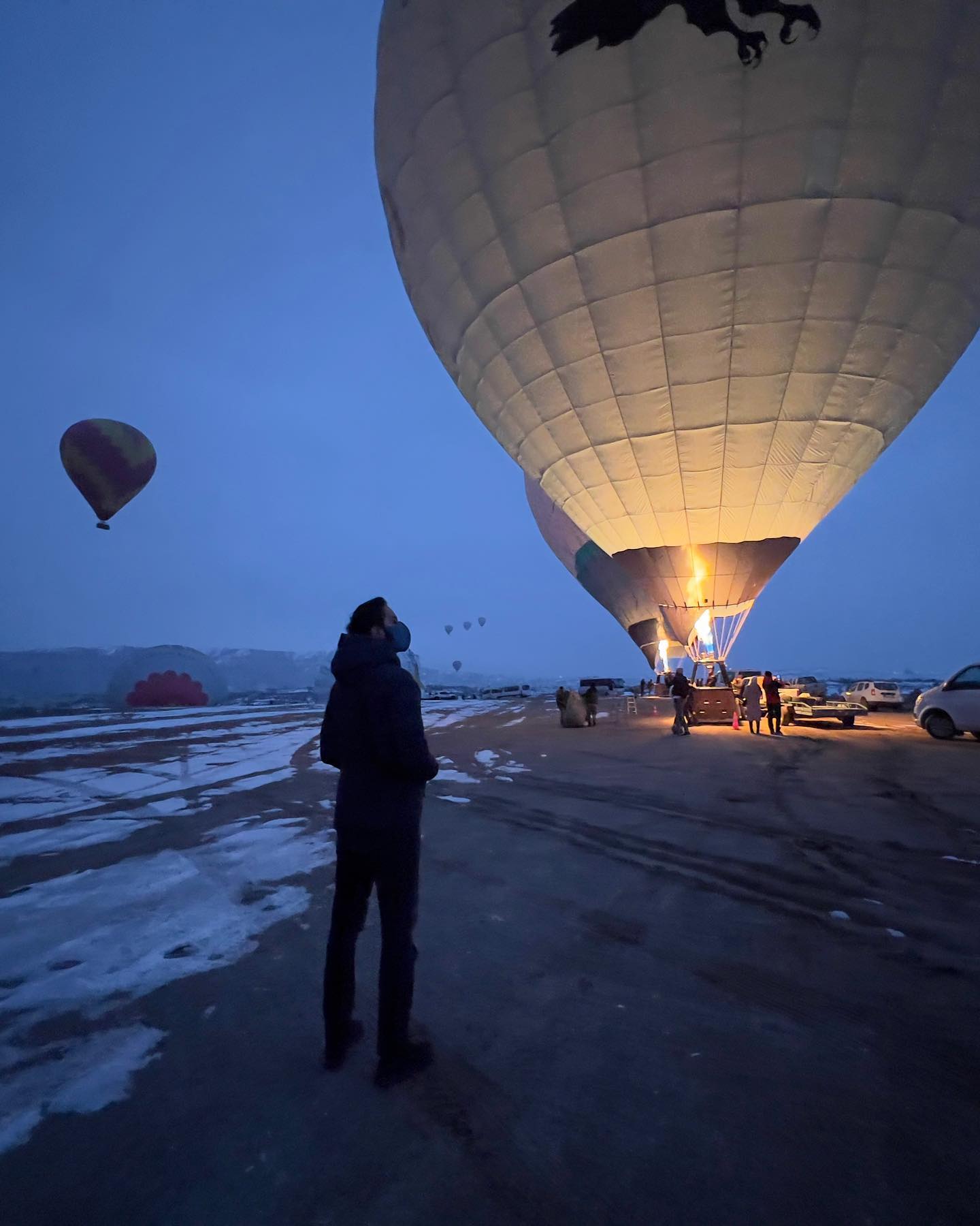 Asser posing in front of a balloon ride in Cappadocia. — Instagram/asser.malik