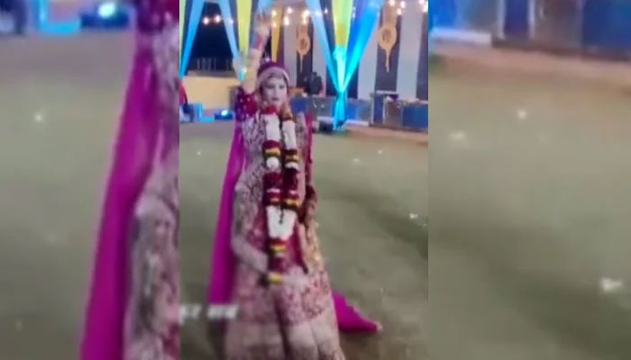 Bride celebrates wedding through aerial firing
