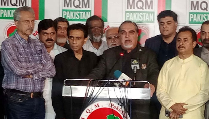 MQM-P Convener Khalid Maqbool Siddiqui along with Sindh Governor Imran Ismail addressing a press conference, at the partys headquarters in Karachi on Sunday, March 13, 2022. PPI