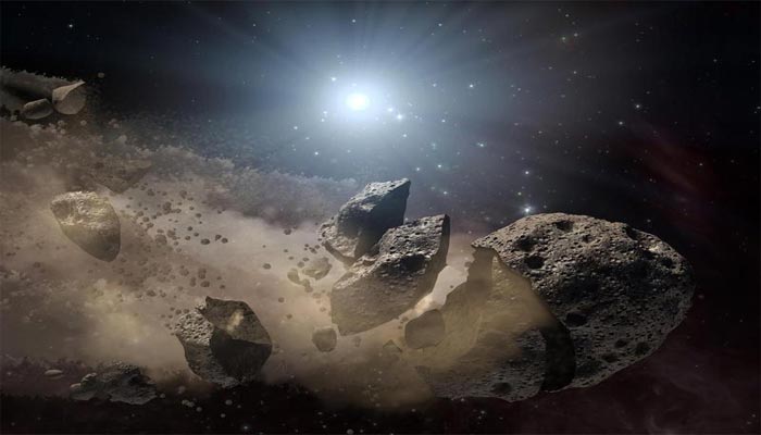 Gambar milik NASA menunjukkan konsep seniman tentang asteroid yang pecah.  Reuters/File
