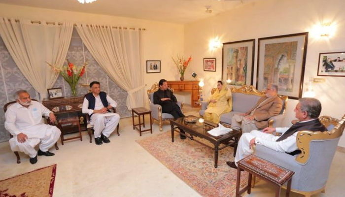 Prime Minister Imran Khan in a meeting with a delegation of the Grand Democratic Alliance (GDA) in Islamabad, on March 14, 2022. — APP