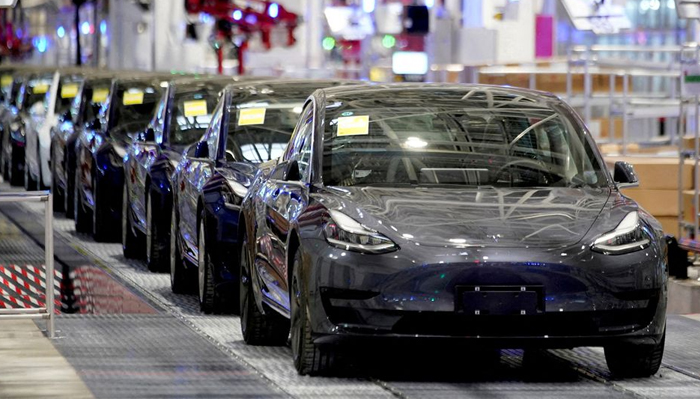 Teslas China-made Model 3 vehicles are seen during a delivery event at its factory in Shanghai, China January 7, 2020. — Reuters