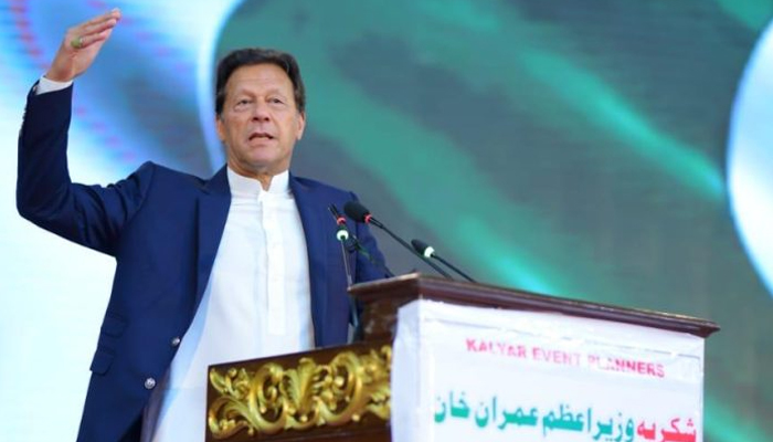 Prime Minister Imran Khan addressing the overseas convention in Islamabad, on March 15, 2022. — APP