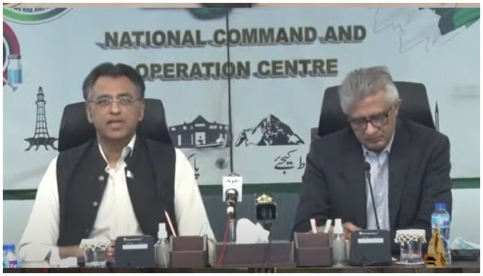 Federal Minister for Planning and Development Asad Umar (L) and Special Assistant to the Prime Minister (SAPM) on Health Dr Faisal Sultan addressing a press conference after the NCOC meeting. — YouTube screengrab