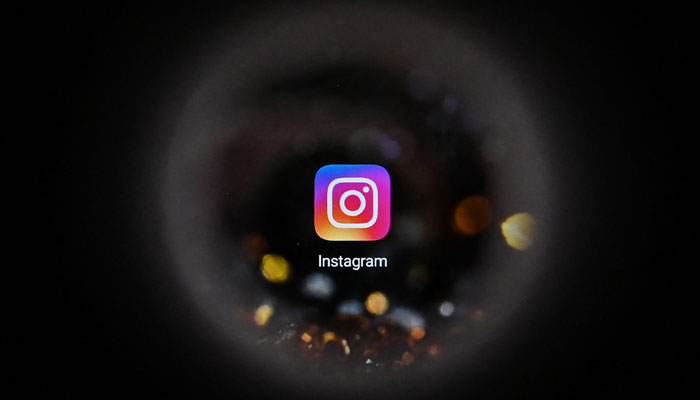 This picture was taken in Moscow on October 5, 2021 shows the US social network Instagram logo on a smartphone screen. — AFP/File