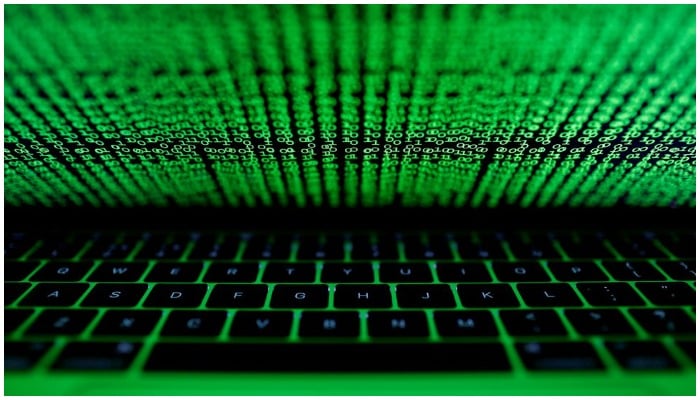 A computer keyboard lit by a displayed cyber code is seen in this illustration picture taken on March 1, 2017. Photo: Reuters/ file
