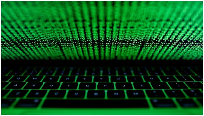 A computer keyboard lit by a displayed cyber code is seen in this illustration picture taken on March 1, 2017. Photo: Reuters/ file