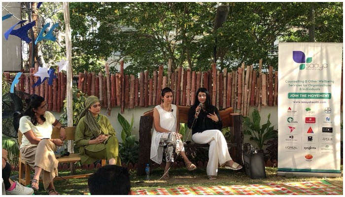 Panellists speaking during a session at the Karachi Wellness Festival — Saaya Health