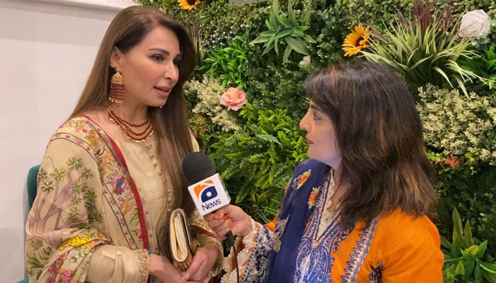 Lollywood actress Reema Khan speaking to Geo News at a charity event. — Imran Munawar