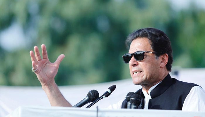 Prime Minister Imran Khan addresses a public gathering in Malakand on Sunday. — Twitter/PMO