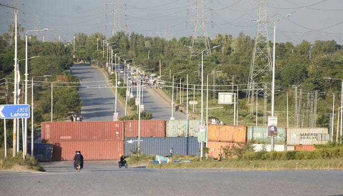 A general view of a highway with shipping containers blocking the entry point in Islamabad, Pakistan October 27, 2021. — Reuters