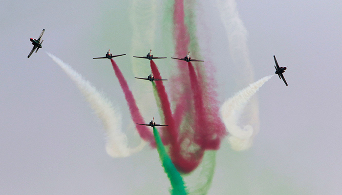 Pakistan Air Force jets perform aerobatic maneuvers during the Pakistan Day parade in Islamabad on March 23, 2022. — AFP