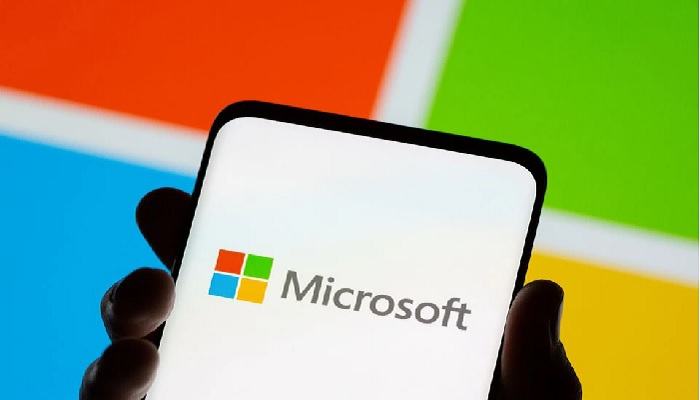 Smartphone is seen in front of Microsoft logo displayed in this illustration taken, July 26, 2021. —Reuters