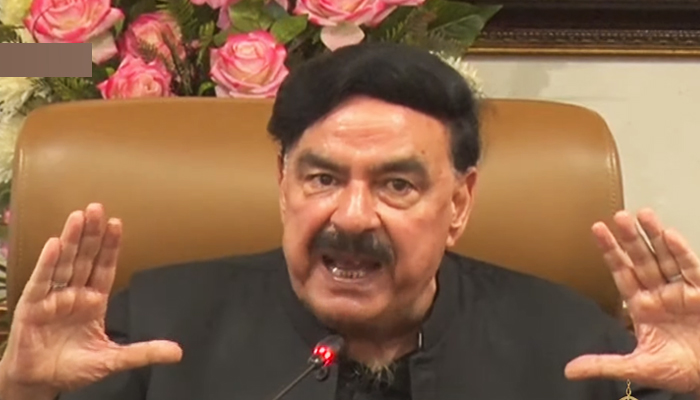 Interior Minister Sheikh Rasheed addressing a press conference in Punjabs capital, Lahore, on March 24, 2022. — Screengrab via YouTube/PTV News