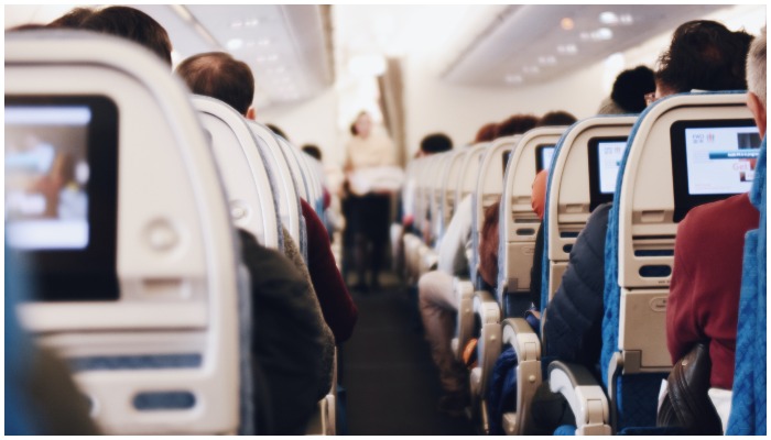 Representational image showing a flight full of passengers. — Unsplash/ Suhyeon Choi