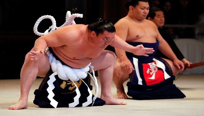 Mongolian-born grand sumo champion Yokozuna Hakuho performs the New Years ring-entering rite at the annual celebration for the New Year at Meiji Shrine in Tokyo, Japan January 7, 2020.—Reuters