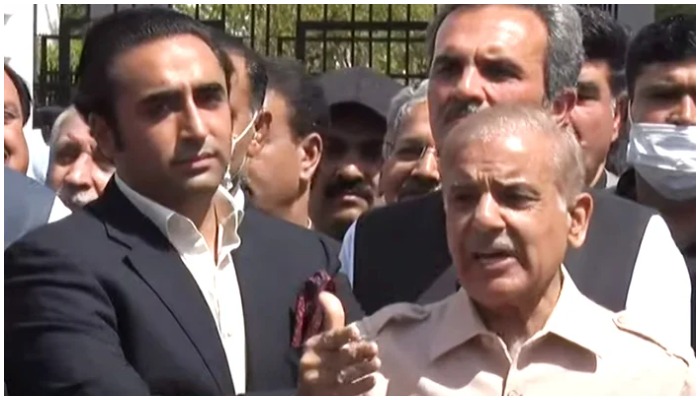 The leaders of the Oppositions two major parties — PPP Chairman Bilawal Bhutto-Zardari (left) and PML-N President Shahbaz Sharif (right) — speak to journalists outside the National Assembly in Islamabad, on March 25, 2022. — YouTube/HumNewsLive