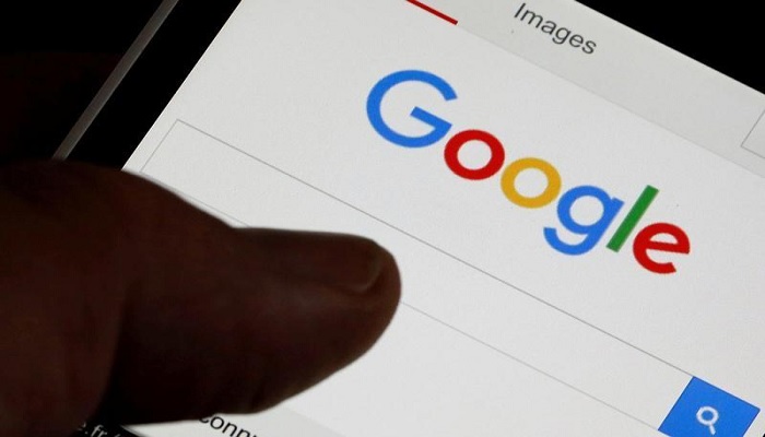 A man holds his smartphone which displays the Google home page, in this picture illustration taken in Bordeaux, Southwestern France, August 22, 2016.—Reuters