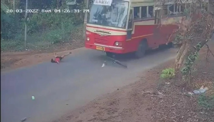 Boy escapes death as speeding bus passes along the road. —Screengrab from Instagram video/trtworld